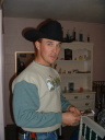 Picture of young man wearing a cowboy hat.